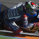Illustration for article titled Lorenzo Grabs Pole With Record Time, Rossi Crashes In MotoGP Finale Qualifying